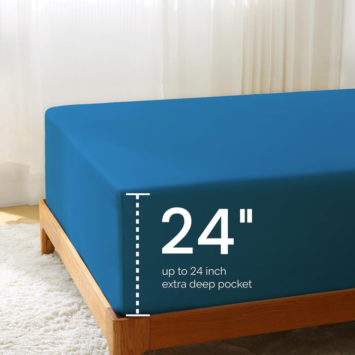 Fitted sheet on a bed, highlighting its extra deep pocket design that fits mattresses from 18 to 24 inches.