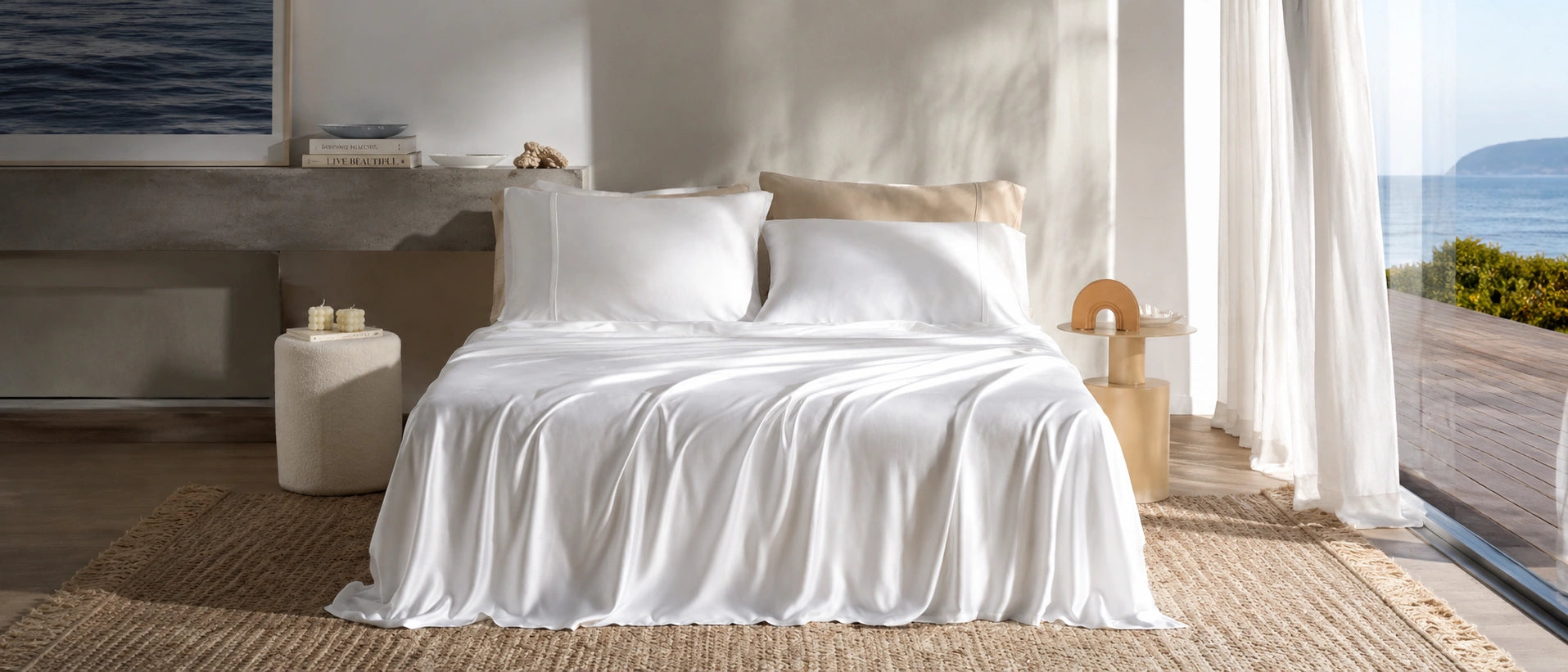 A calm modern bedroom dressed in soft white bamboo bedding at dawn