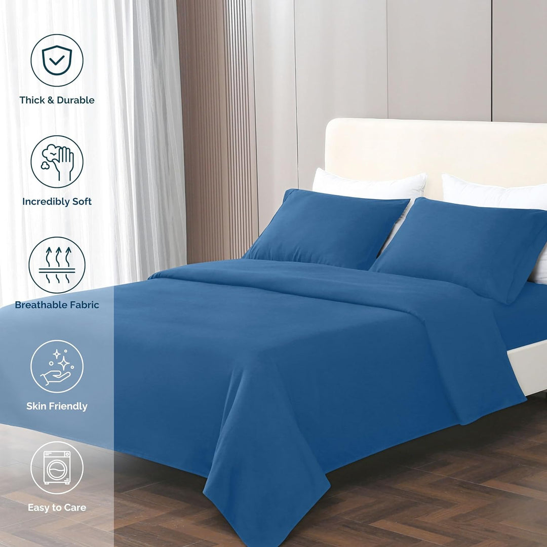 GOKOTTA blue microfiber sheets arranged on a stylishly made bed in a modern bedroom.