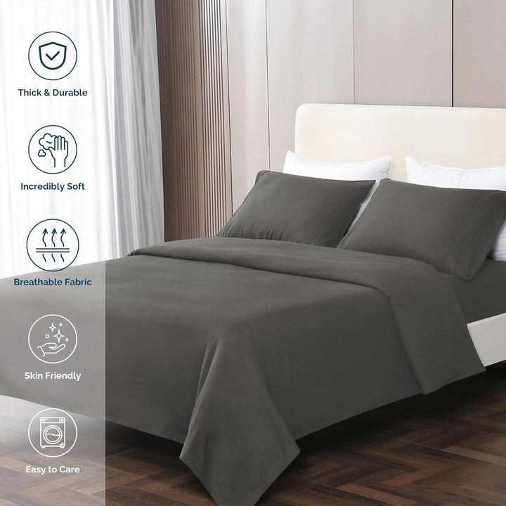 GOKOTTA dark grey sheets elegantly arranged on a bed, creating a modern and cozy atmosphere.