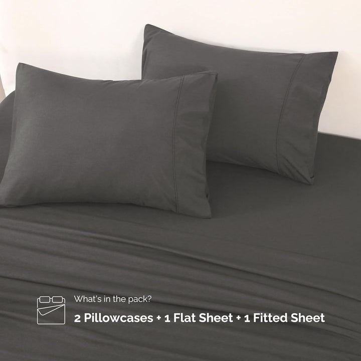 Complete set of GOKOTTA dark grey microfiber sheets, including flat sheet, fitted sheet, and envelope pillowcases.