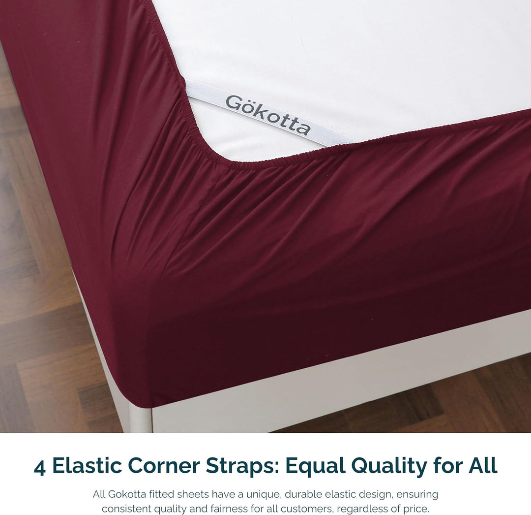 Image highlighting the elastic corner straps on the GOKOTTA fitted sheet for a secure fit.