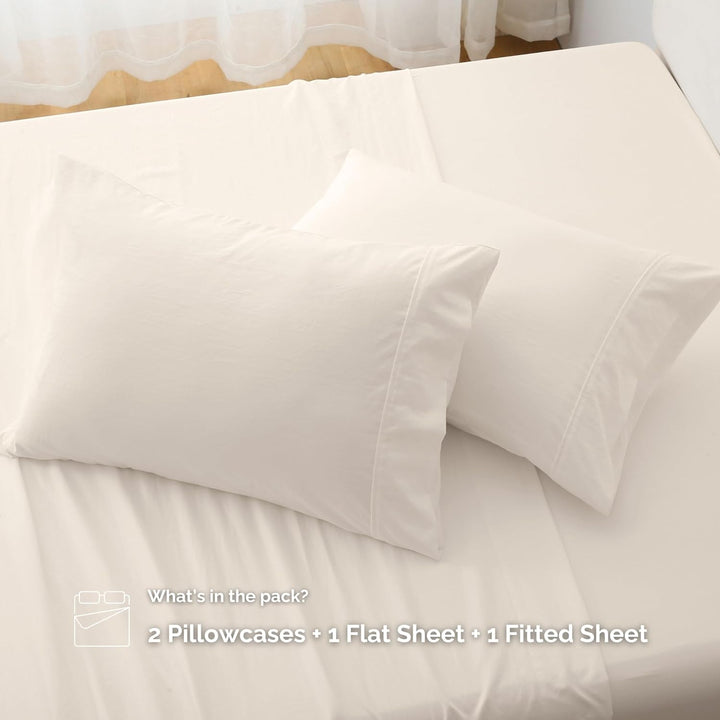 Complete set of GOKOTTA light beige microfiber sheets, including flat sheet, fitted sheet, and envelope pillowcases.